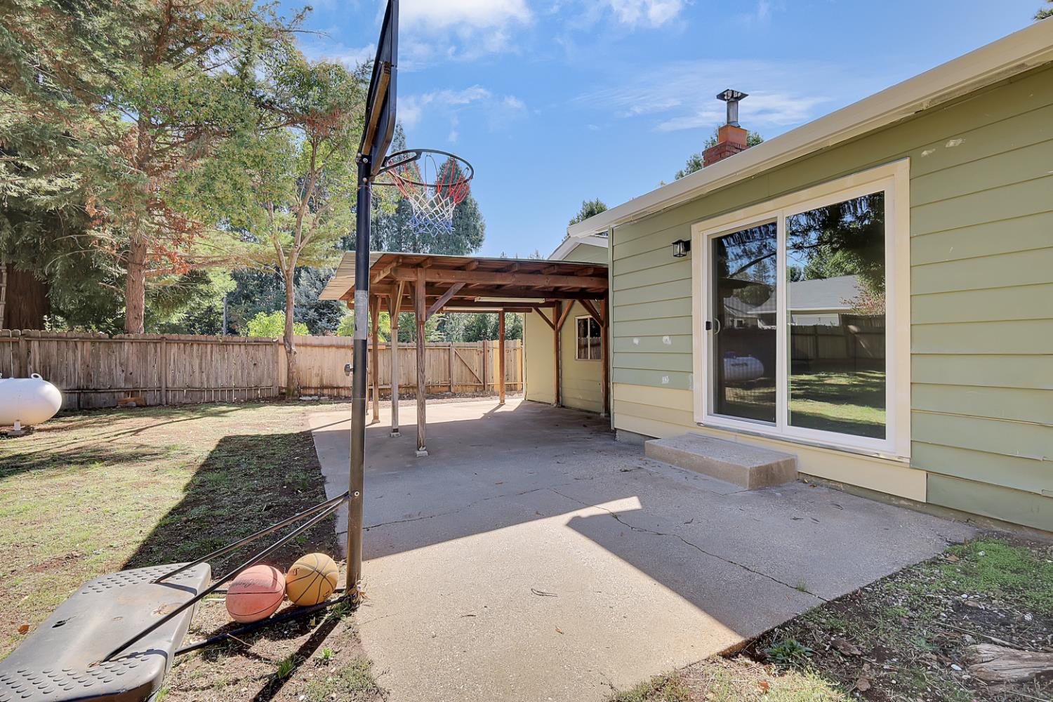 10673 Alta Street Grass Valley, CA 95945 - Photo 34 of 38 a front view of a house with a yard