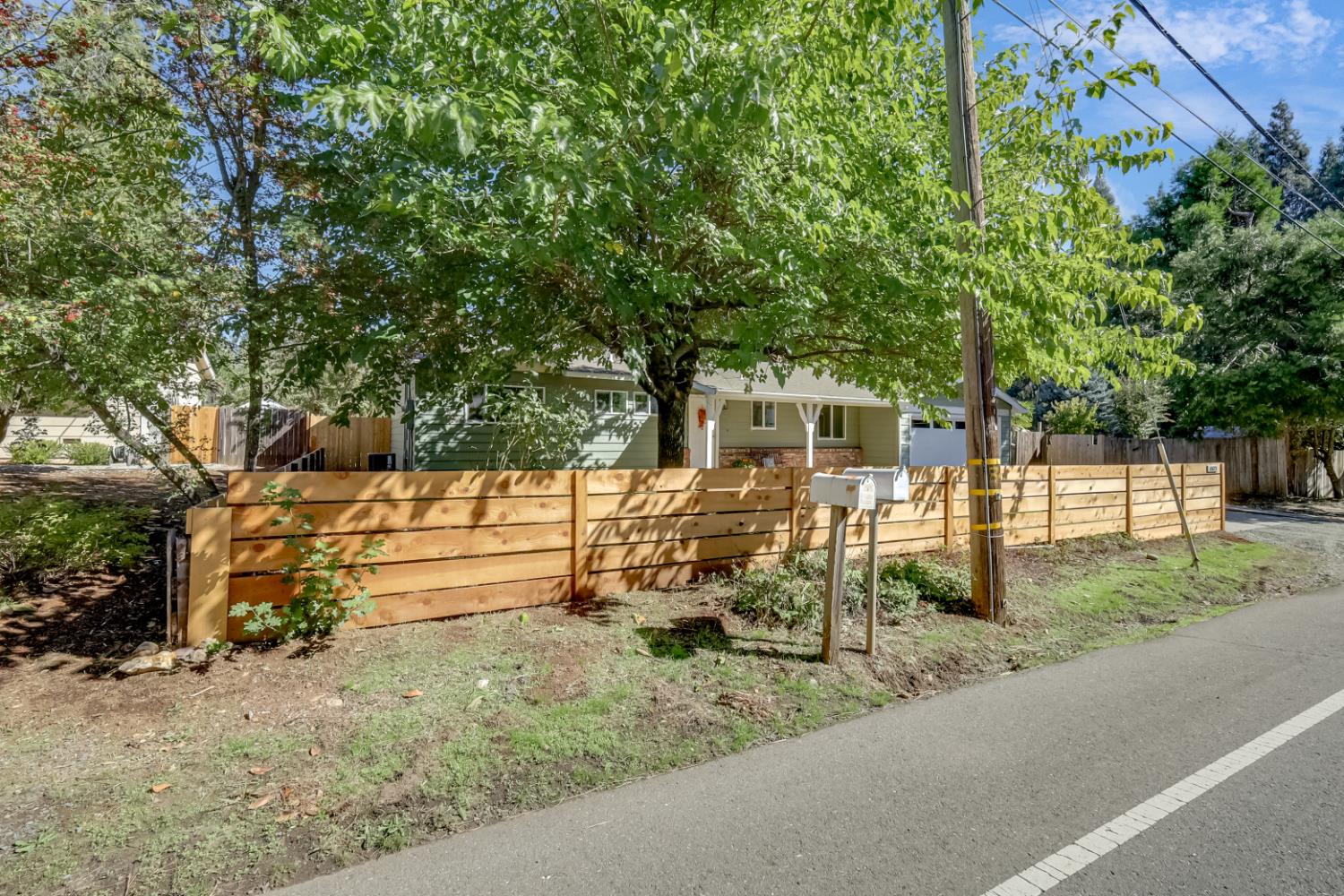 10673 Alta Street Grass Valley, CA 95945 - Photo 4 of 38 a view of a house with backyard