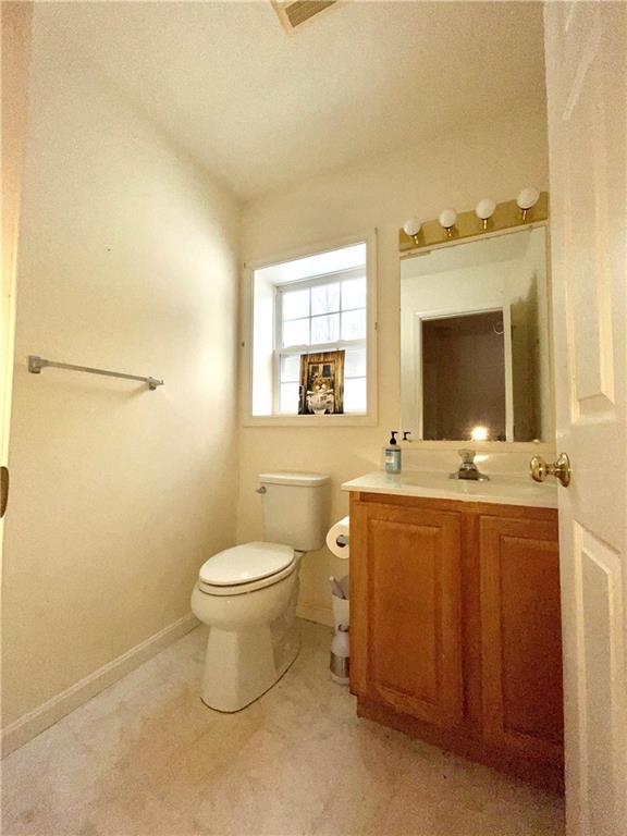 211 Fox Hollow Road Dayton, PA 16222 - Photo 11 of 25 a bathroom with a toilet sink and mirror
