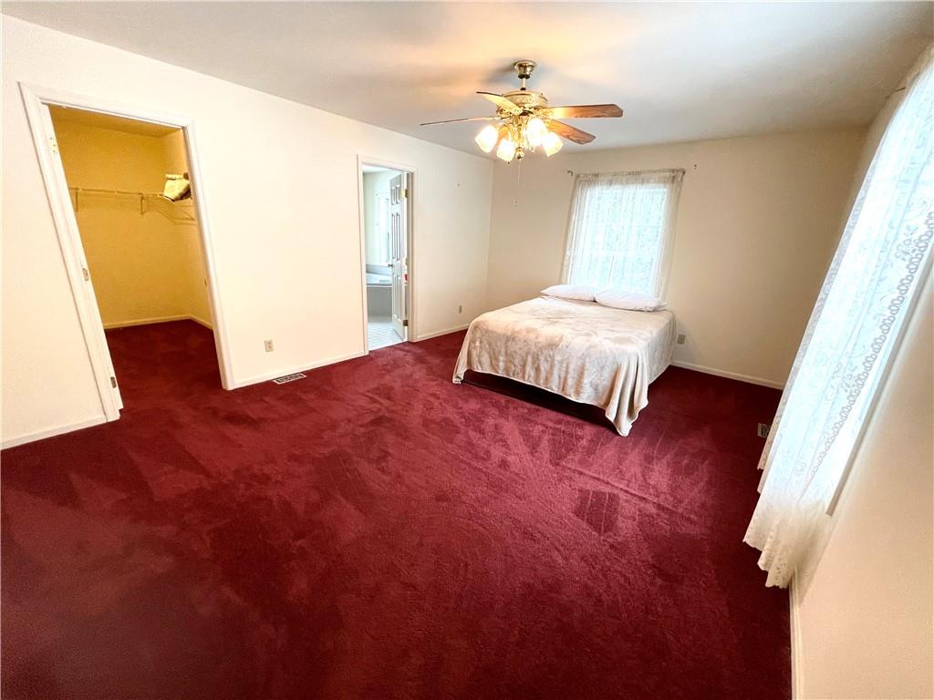 211 Fox Hollow Road Dayton, PA 16222 - Photo 12 of 25 a spacious bedroom with a bed and wooden floor