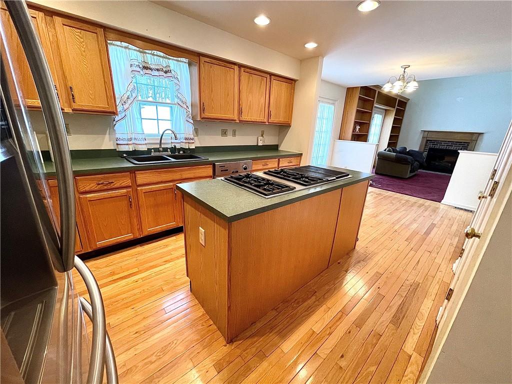 211 Fox Hollow Road Dayton, PA 16222 - Photo 3 of 25 a kitchen with stainless steel appliances granite countertop a stove a sink and a refrigerator
