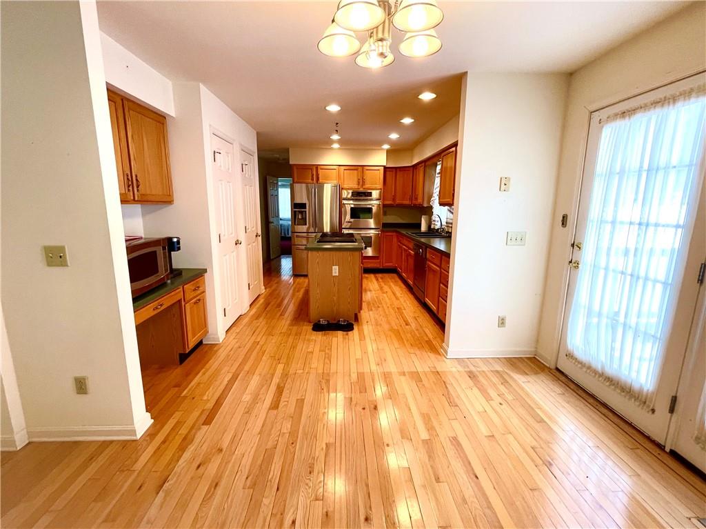 211 Fox Hollow Road Dayton, PA 16222 - Photo 4 of 25 a view of a living room kitchen with a sink and wooden floor