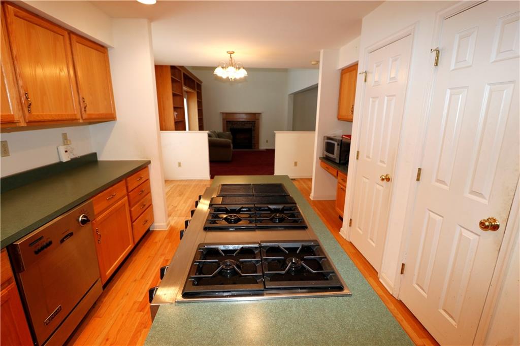 211 Fox Hollow Road Dayton, PA 16222 - Photo 5 of 25 a kitchen with wooden cabinets stove and sink