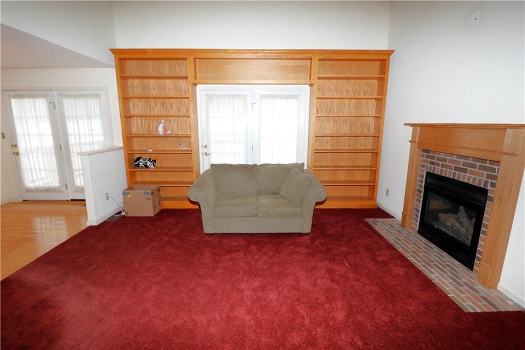 211 Fox Hollow Road Dayton, PA 16222 - Photo 9 of 25 a living room with furniture and a fireplace