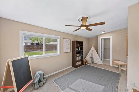 a view of a livingroom with furniture and windows