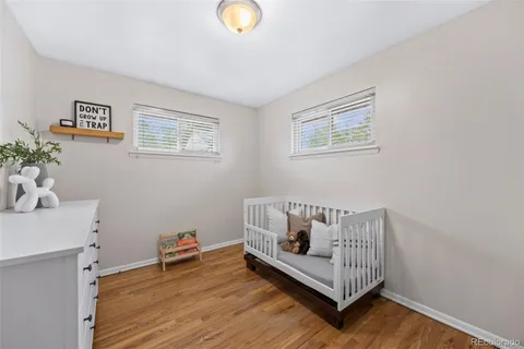 a room with furniture and wooden floor