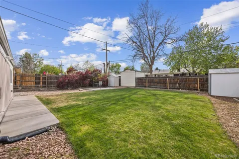 a view of a backyard with a garden