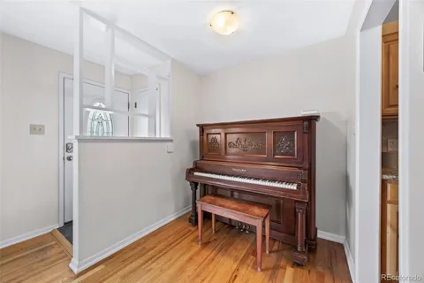 a view of a livingroom with furniture and wooden floor