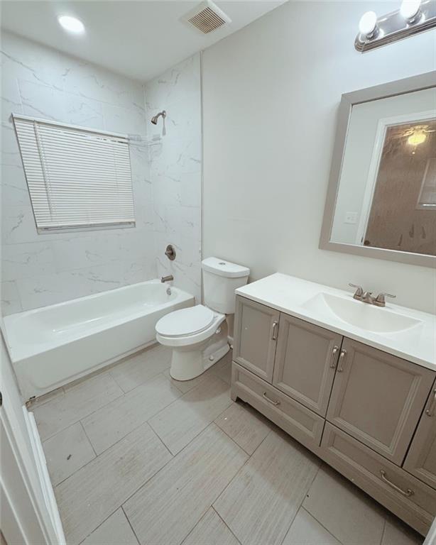 2933 Port Royal Lane Decatur, GA 30034 - Photo 4 of 12 a bathroom with a double vanity sink toilet and shower