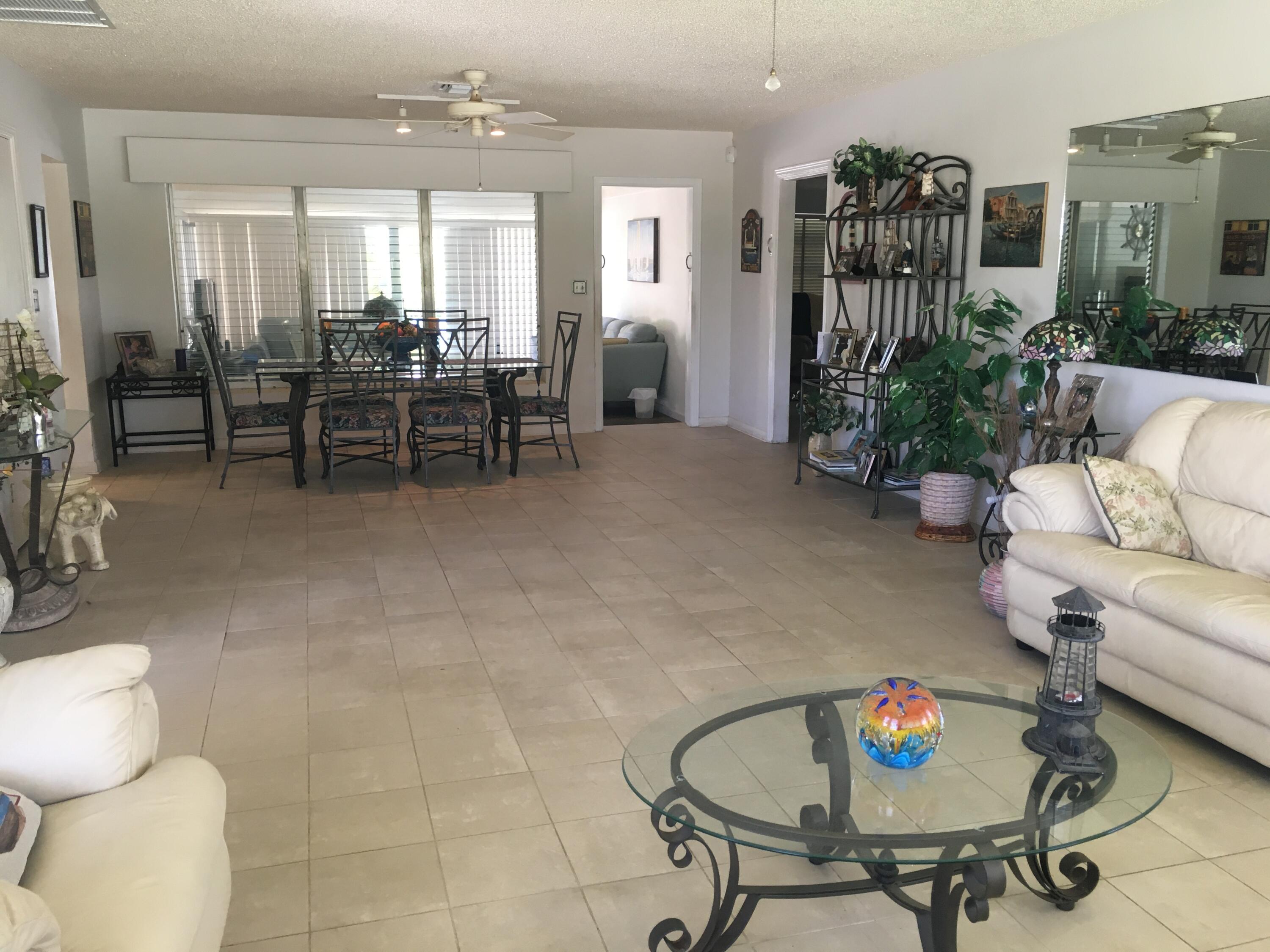 325 Inlet Way Palm Beach Shores, FL 33404 - Photo 17 of 30 dining accesses to kitchen on left