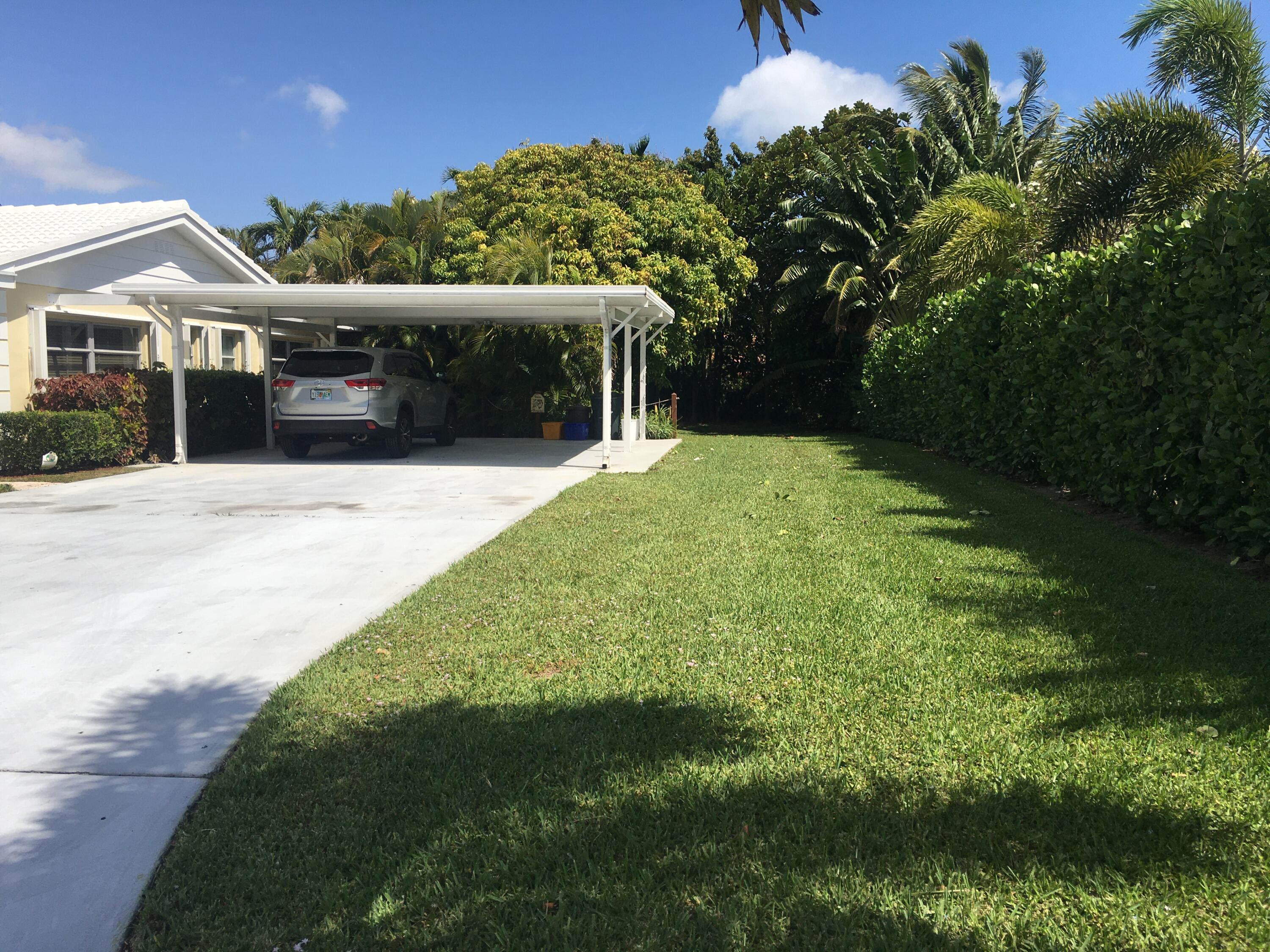 325 Inlet Way Palm Beach Shores, FL 33404 - Photo 2 of 30 large carport