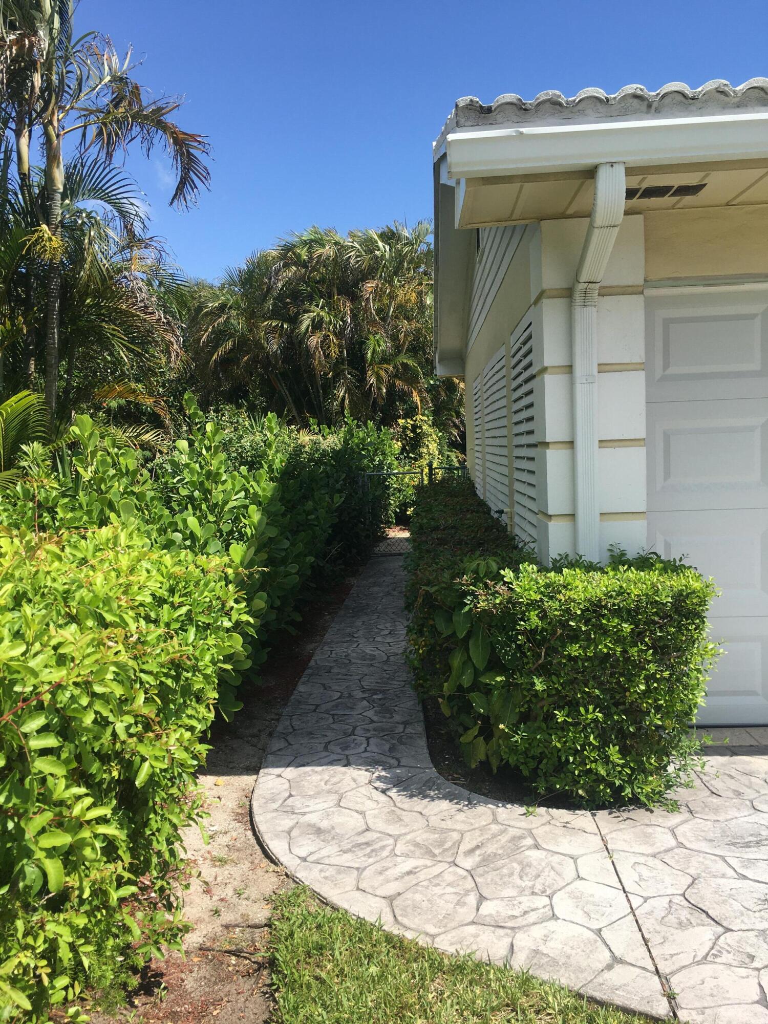 325 Inlet Way Palm Beach Shores, FL 33404 - Photo 6 of 30 left of garage