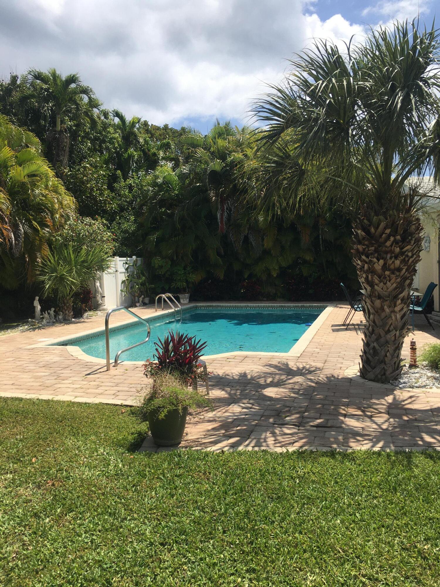 325 Inlet Way Palm Beach Shores, FL 33404 - Photo 10 of 30 more yard beyond the trees