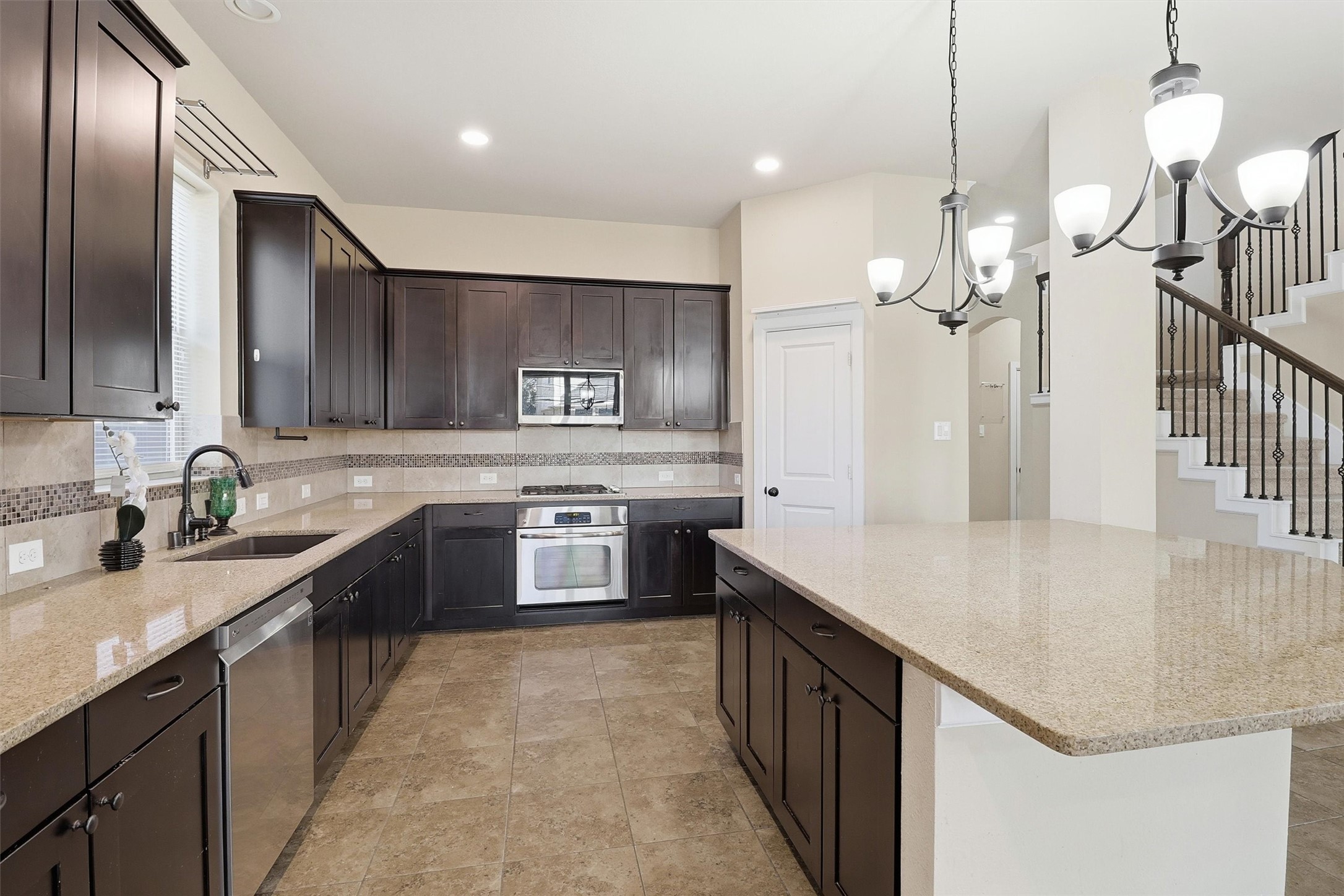 26202 Rustic Ranch Lane Katy, TX 77494 - Photo 14 of 50 An abundance of cabinets and food prep areas.