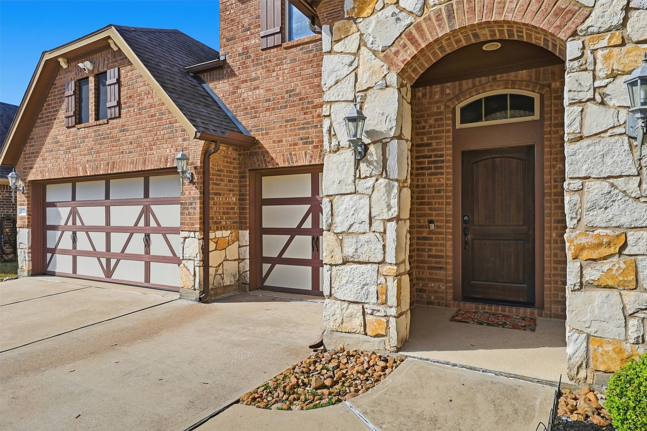 26202 Rustic Ranch Lane Katy, TX 77494 - Photo 4 of 50 Beautiful stone details on the inviting entrance.