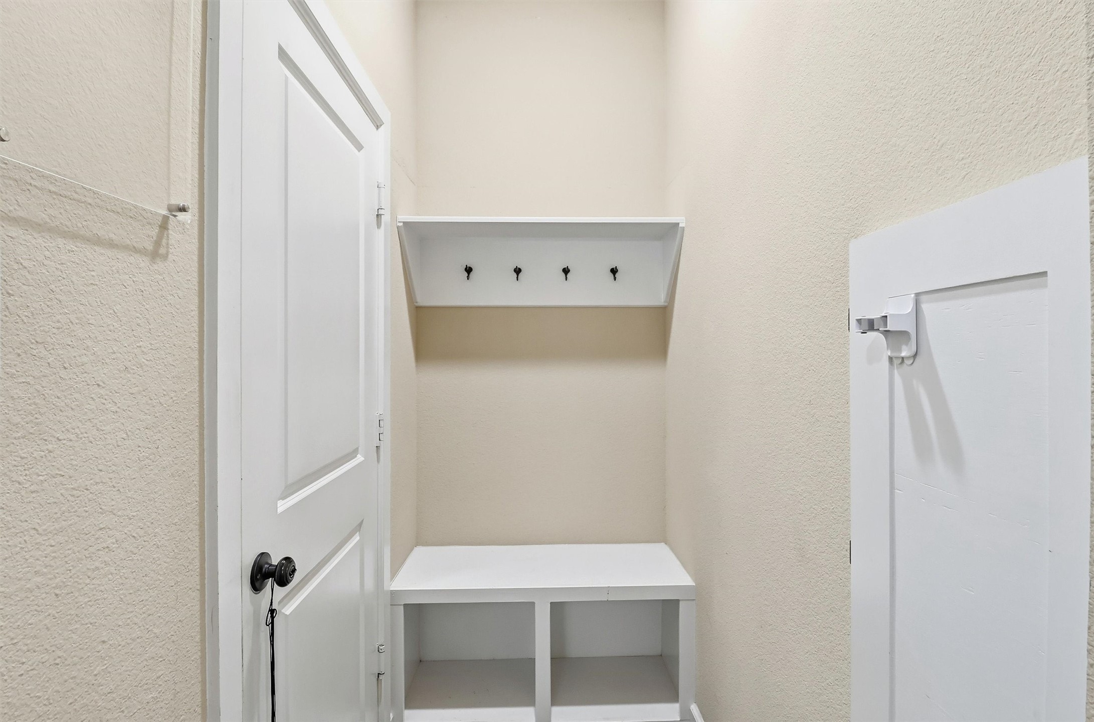 26202 Rustic Ranch Lane Katy, TX 77494 - Photo 8 of 50 A drop zone is conveniently located by the garage.