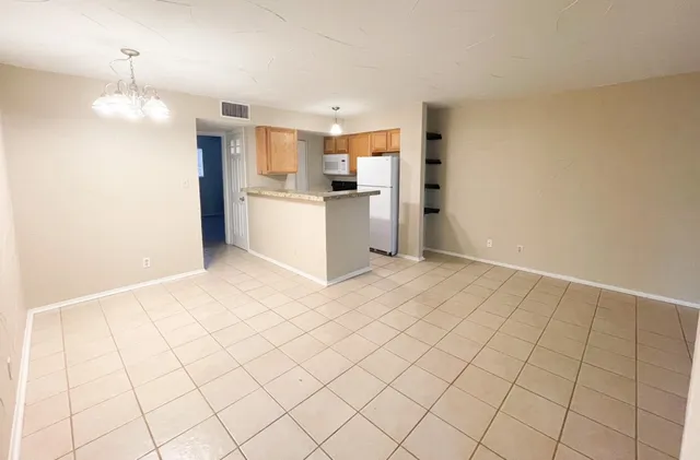 a view of a kitchen with a sink