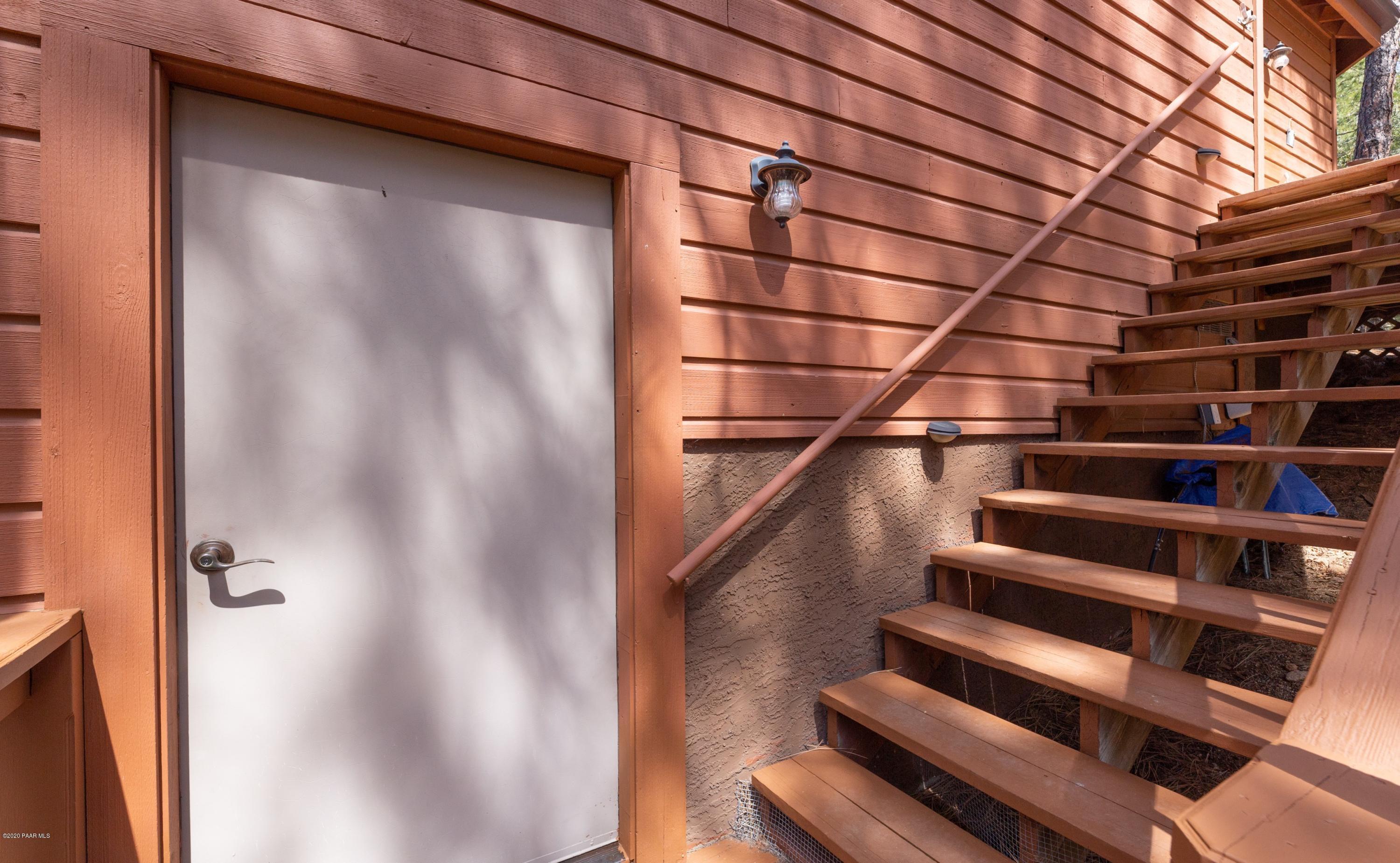 1128 East Timber Ridge Road Prescott, AZ 86303 - Photo 25 of 30 025_Stairs To Lower Unfinished Level