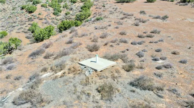 a view of a backyard of a house