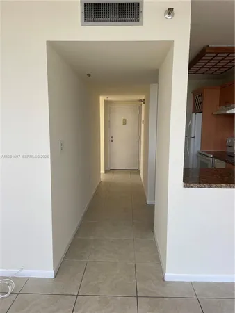 a view of a hallway with elevator