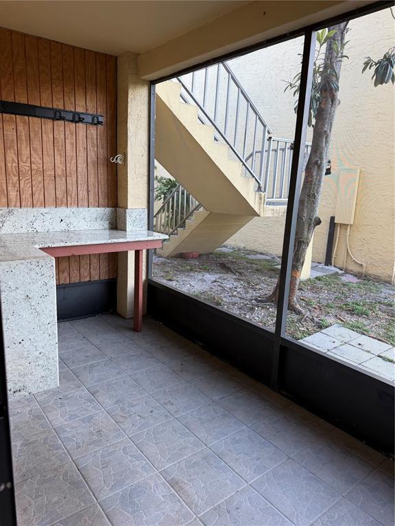 7409 Abonado Road, Unit 7409 Tampa, FL 33615 - Photo 22 of 25 a view of entryway with kitchen