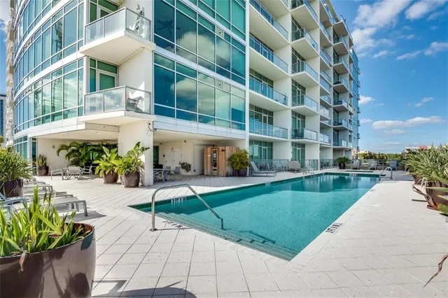 a view of a building with a yard