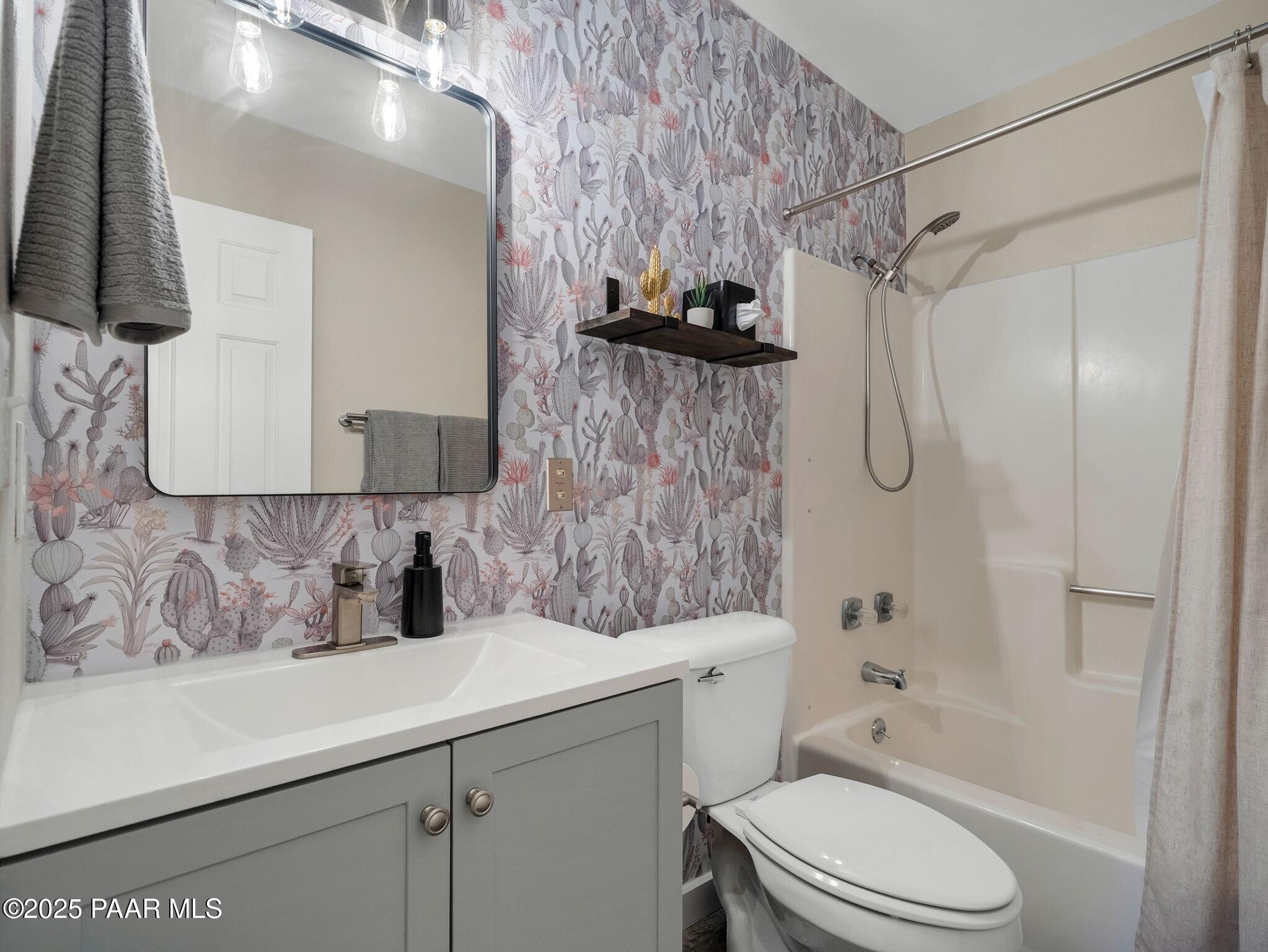 352 Rim Rock Circle, Unit 2 Prescott, AZ 86303 - Photo 17 of 25 a bathroom with a sink toilet and shower