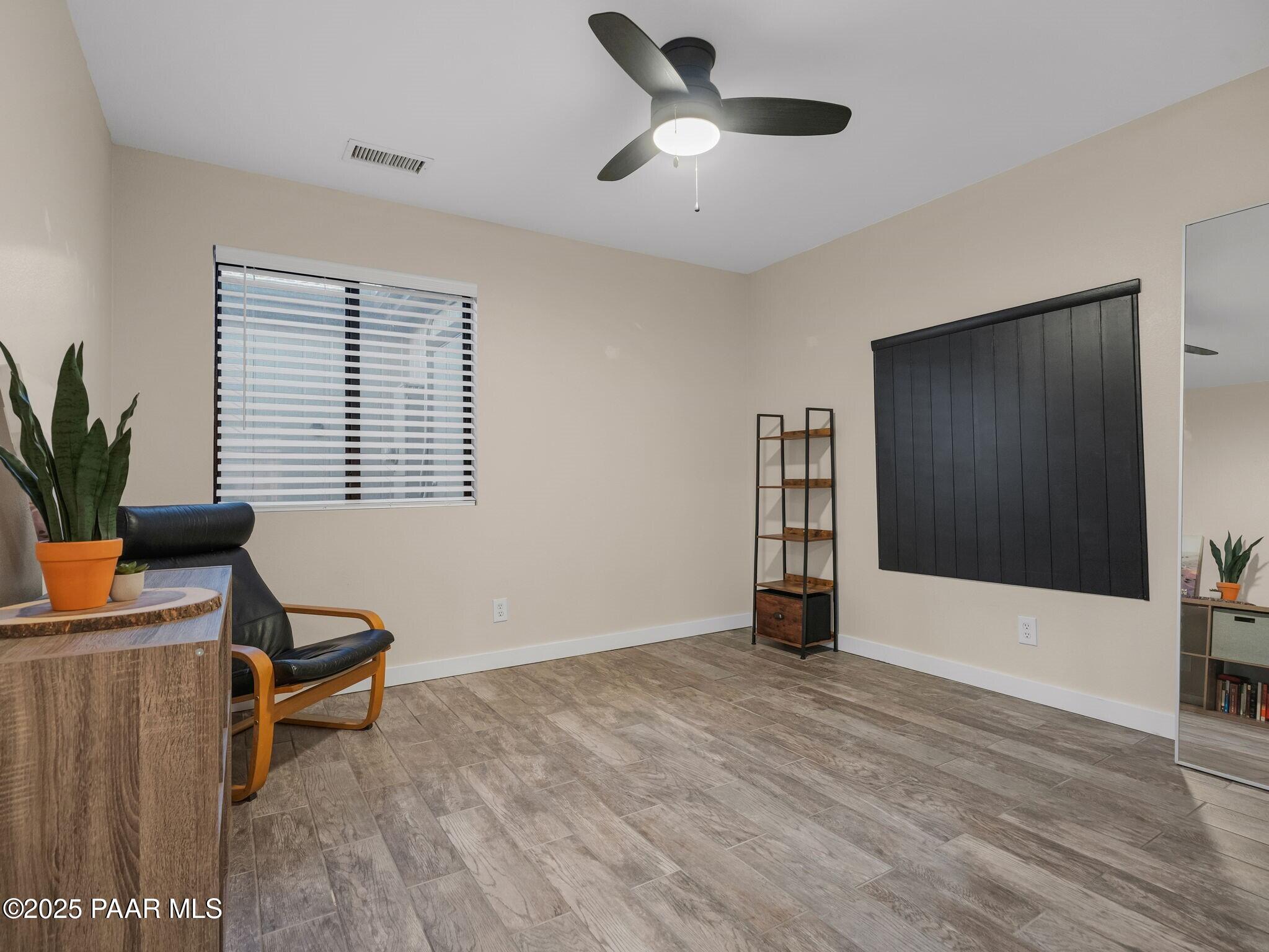 352 Rim Rock Circle, Unit 2 Prescott, AZ 86303 - Photo 18 of 25 a living room with furniture and window