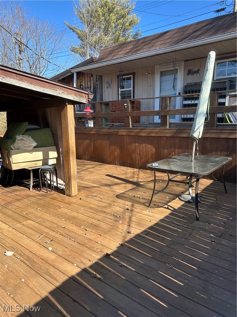 167 Andover Road Woodsfield, OH 43793 - Photo 13 of 50 View of wooden deck and She shed in private back yard