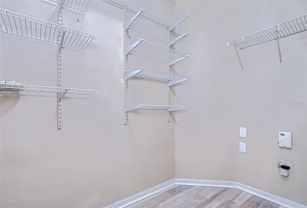 a view of an empty walk in closet