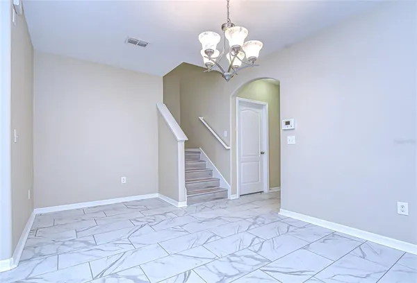 a view of a chandelier in a room