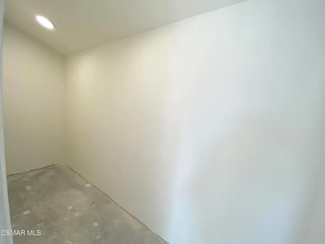 a view of a terrace with a garden and mountain view