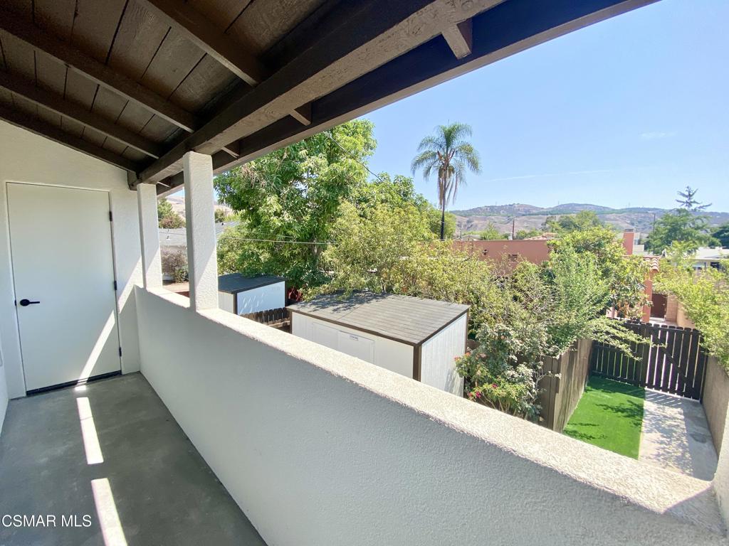 423 Saratoga Street, Unit B Fillmore, CA 93015 - Photo 3 of 20 a view of a balcony with chairs