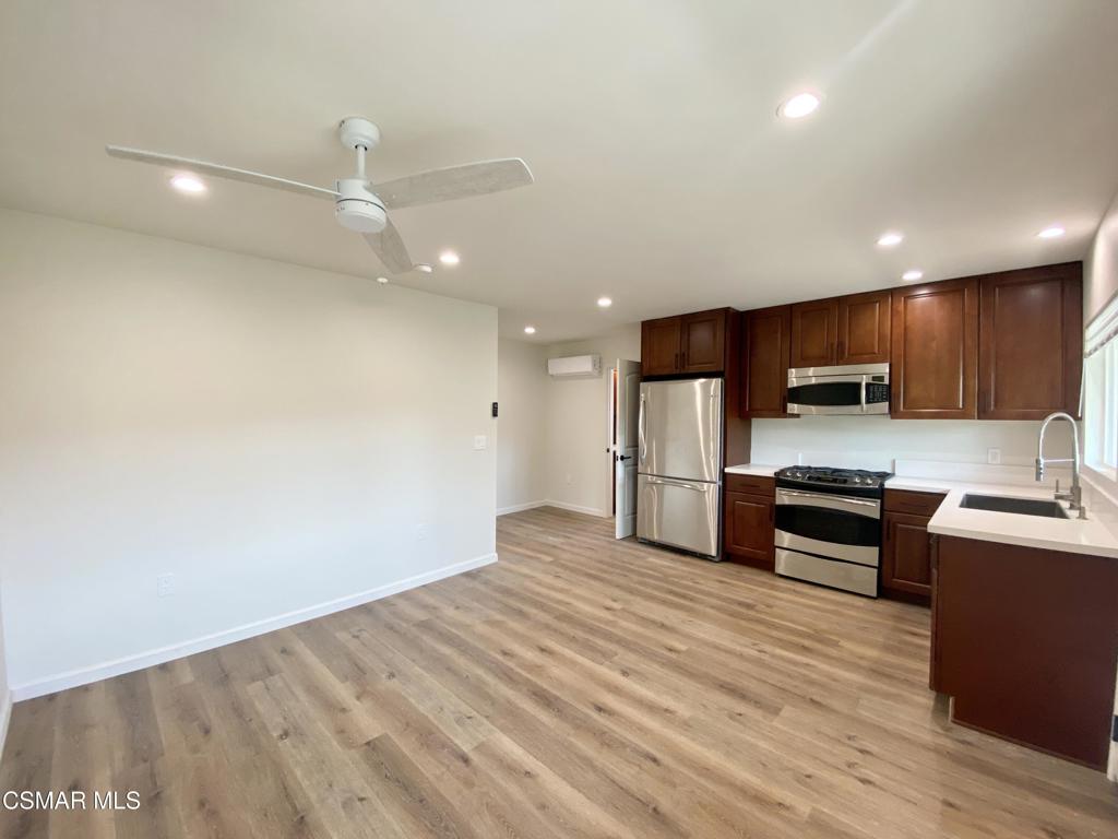 423 Saratoga Street, Unit B Fillmore, CA 93015 - Photo 7 of 20 a view of kitchen with microwave and stove