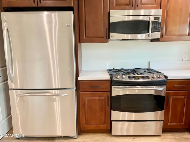 a view of kitchen sink and window