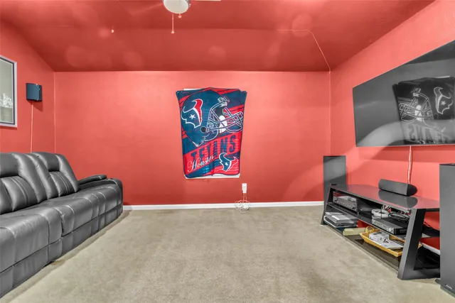 a room with furniture and a flat screen tv