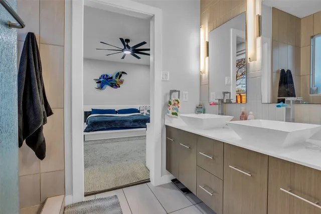 a bathroom with a sink and a mirror