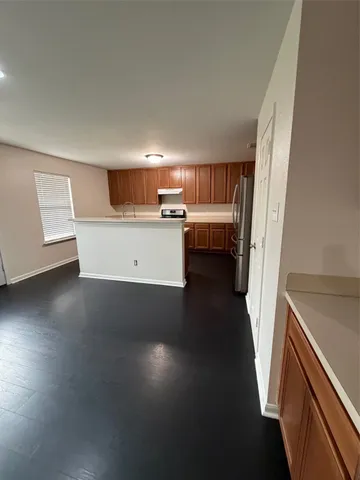 a view of a kitchen and utility room