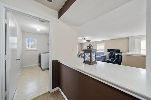 a view of a hallway to a house