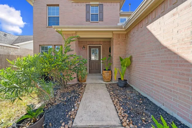 a view of a pathway with a house