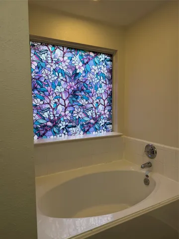 a bathroom with a bathtub