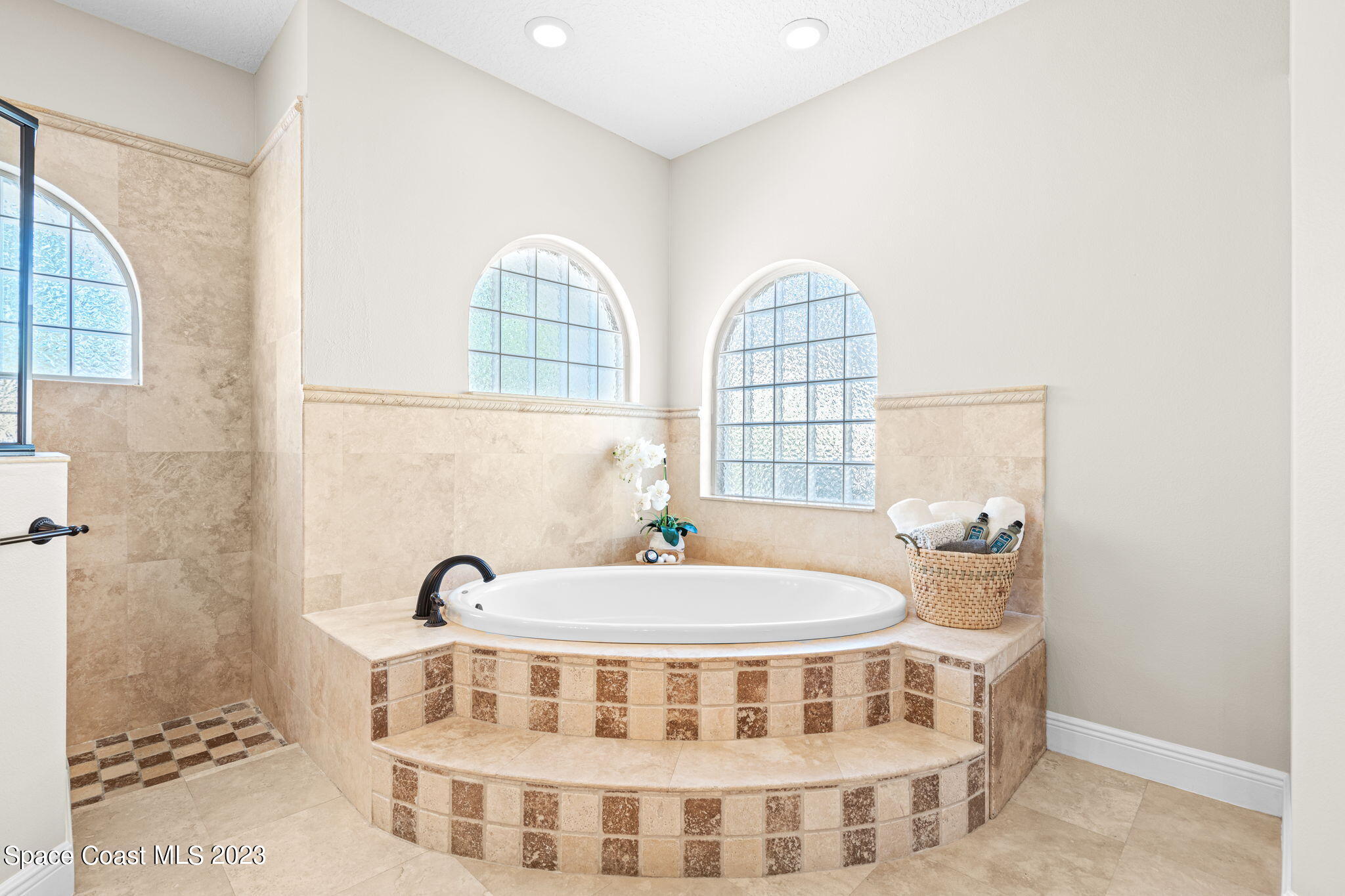 3308 Cappio Drive Melbourne, FL 32940 - Photo 15 of 42 a bedroom with a bed and a window