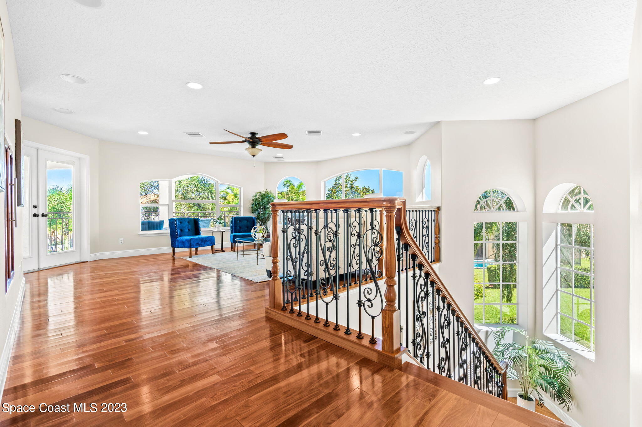 3308 Cappio Drive Melbourne, FL 32940 - Photo 19 of 42 a view of an entryway with wooden floor