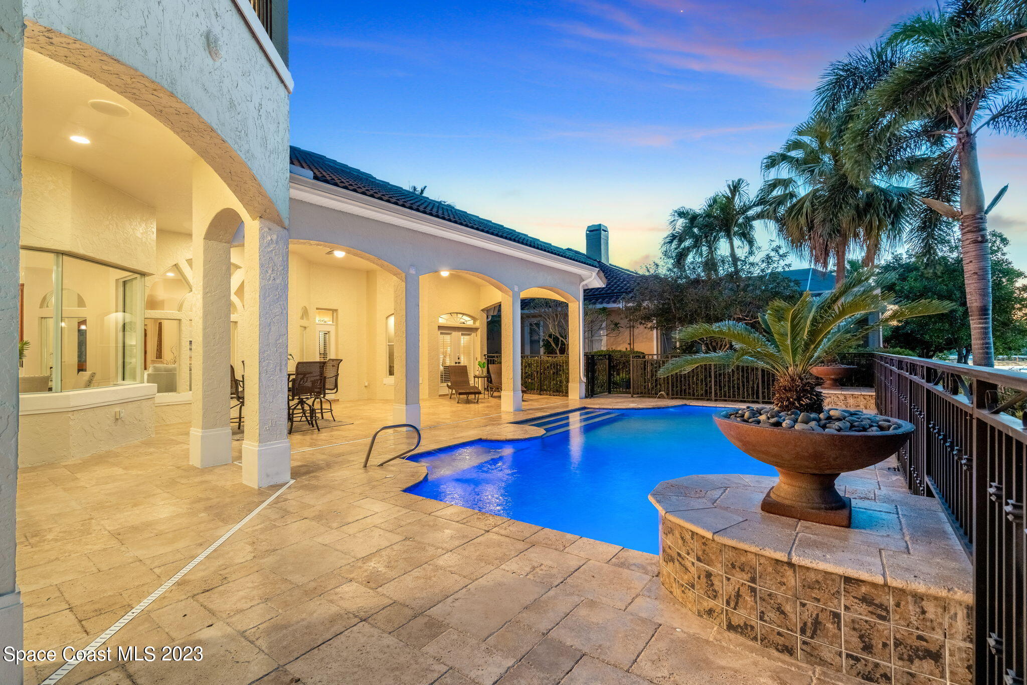 3308 Cappio Drive Melbourne, FL 32940 - Photo 32 of 42 a view of swimming pool with outdoor seating