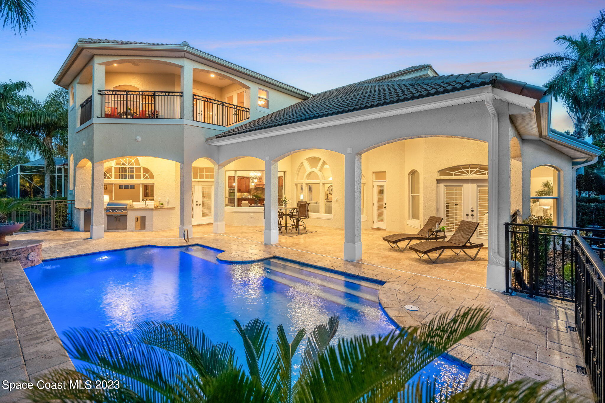 3308 Cappio Drive Melbourne, FL 32940 - Photo 33 of 42 a view of swimming pool with outdoor seating