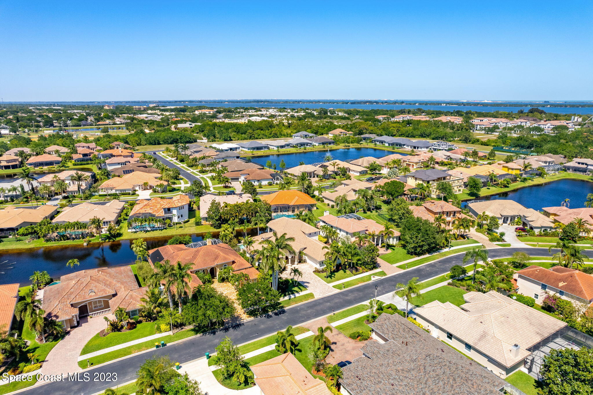 3308 Cappio Drive Melbourne, FL 32940 - Photo 38 of 42 an aerial view of residential building and lake
