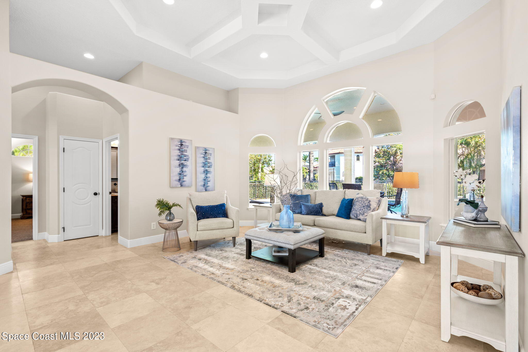 3308 Cappio Drive Melbourne, FL 32940 - Photo 5 of 42 a living room with furniture and a large window