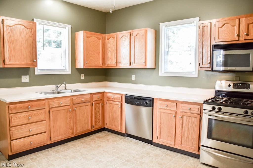 1210 Amherst Road Northeast Massillon, OH 44646 - Photo 4 of 15 Spacious kitchen with great cabinet and counter space.
