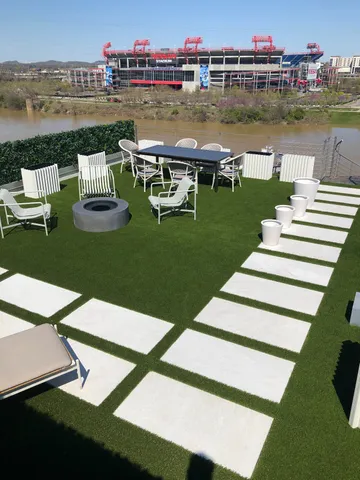 a view of a patio with swimming pool