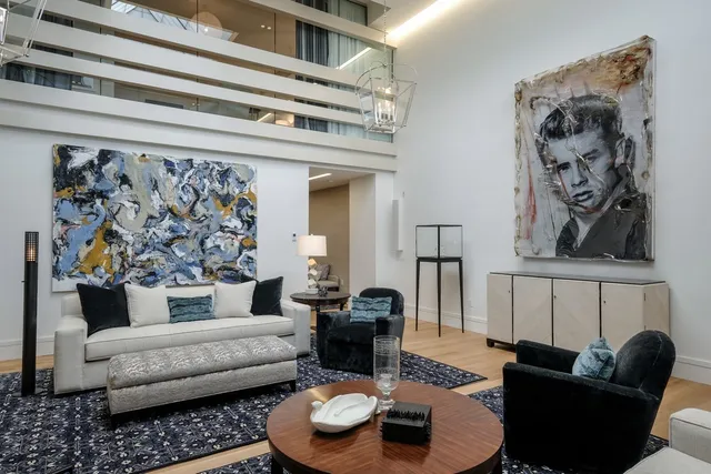 a living room with furniture and a couch